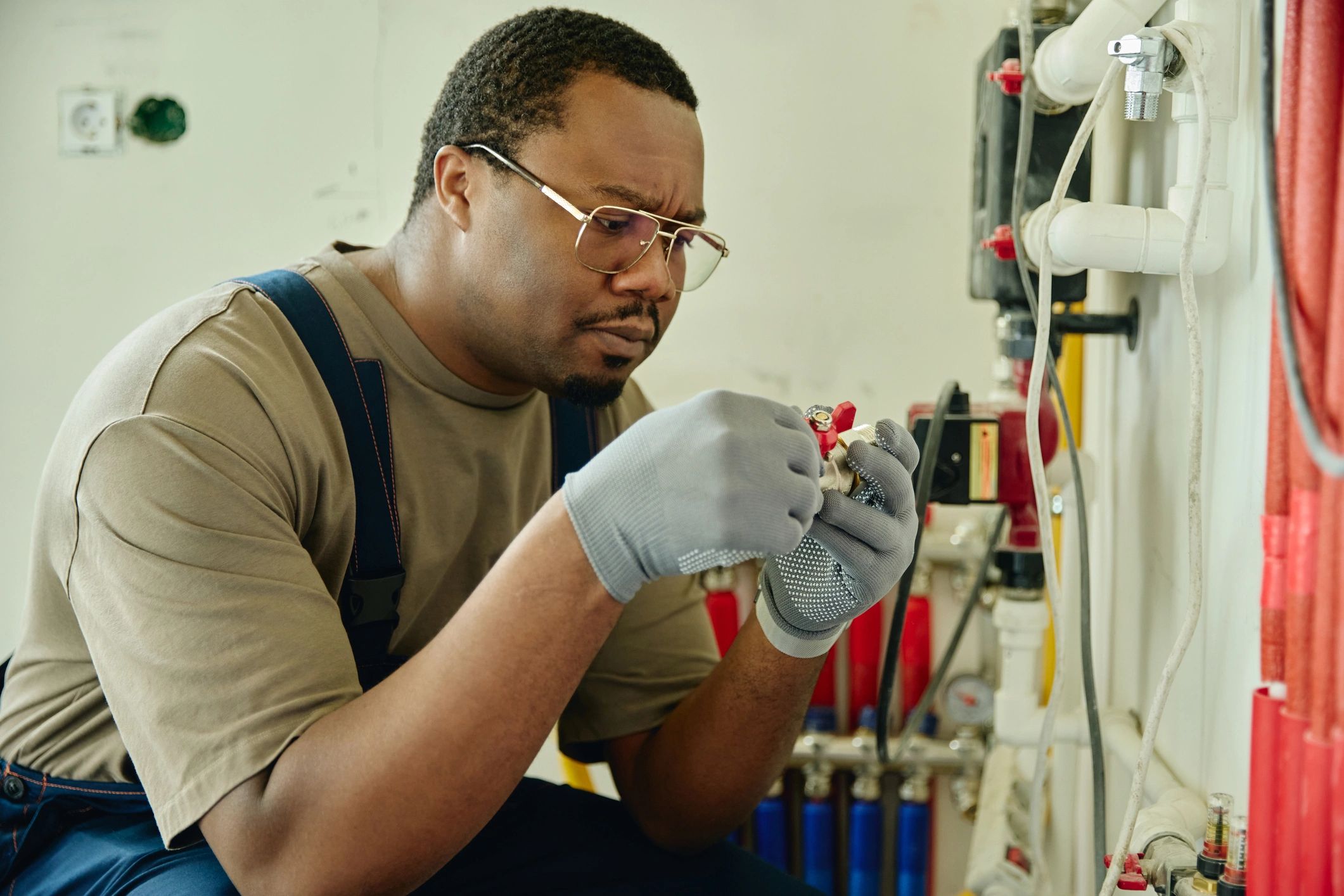 Repair technician working on building system